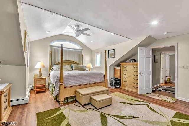 bedroom with light wood-type flooring, vaulted ceiling, a ceiling fan, and recessed lighting