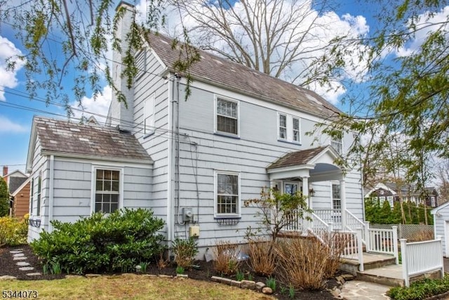 537 Summit Ave, Maplewood Twp, NJ 07040 - view of front of house with a chimney