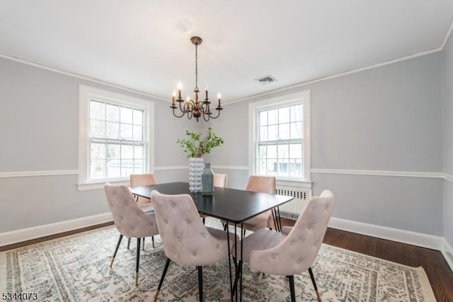 537 Summit Ave, Maplewood Twp, NJ 07040 - dining area featuring radiator, crown molding, a chandelier, wood finished floors, and baseboards