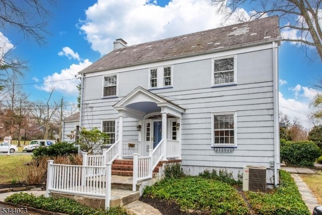 537 Summit Ave, Maplewood Twp, NJ 07040 - view of front of home featuring a chimney and central AC unit