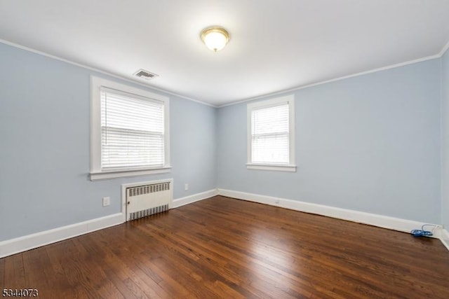 537 Summit Ave, Maplewood Twp, NJ 07040 - empty room featuring radiator, crown molding, wood finished floors, and baseboards