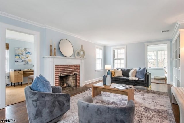 537 Summit Ave, Maplewood Twp, NJ 07040 - living area with ornamental molding, a fireplace, radiator heating unit, healthy amount of natural light, and wood finished floors