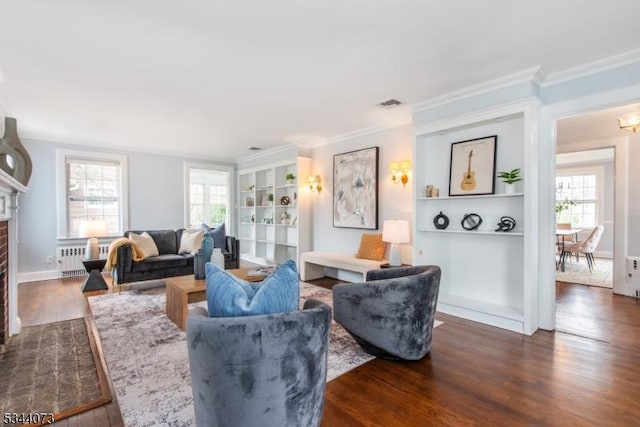 537 Summit Ave, Maplewood Twp, NJ 07040 - living room with dark wood-type flooring, radiator heating unit, healthy amount of natural light, a fireplace, and ornamental molding