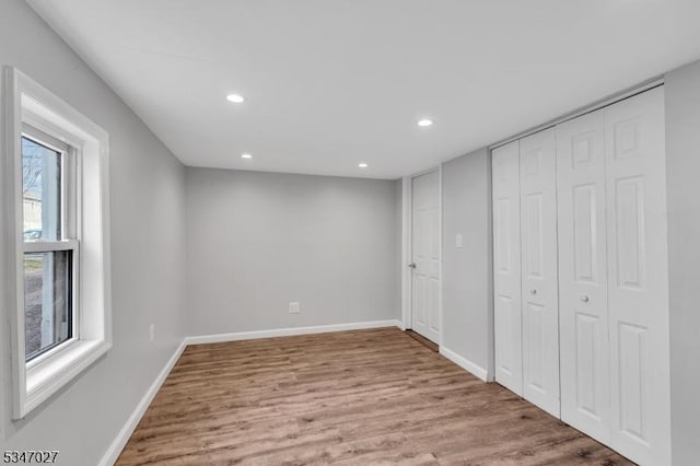 1218 Kline Pl, Rahway City, NJ 07065 - unfurnished bedroom featuring wood finished floors, baseboards, recessed lighting, and a closet