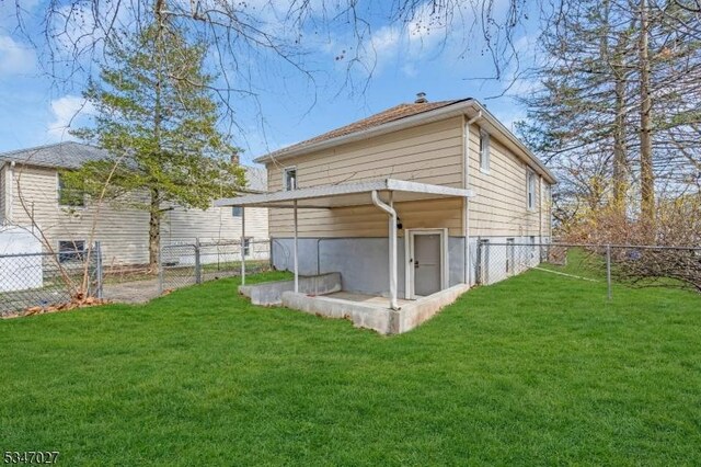 1218 Kline Pl, Rahway City, NJ 07065 - rear view of house with a chimney