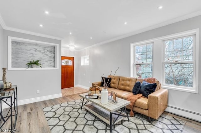 1218 Kline Pl, Rahway City, NJ 07065 - living room featuring a baseboard radiator, crown molding, light wood-style floors, recessed lighting, and baseboards