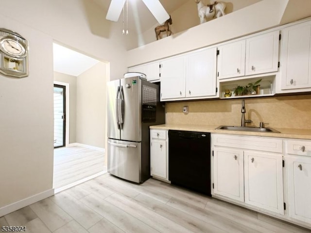 kitchen with dishwasher, a sink, freestanding refrigerator, a ceiling fan, and light countertops