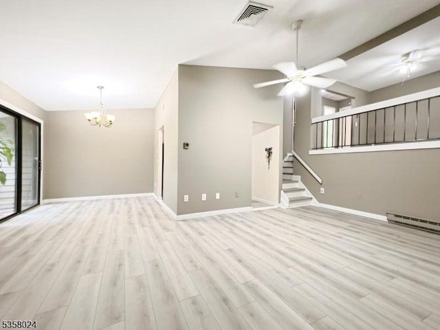 unfurnished living room with vaulted ceiling, a chandelier, a ceiling fan, stairway, and light wood-type flooring