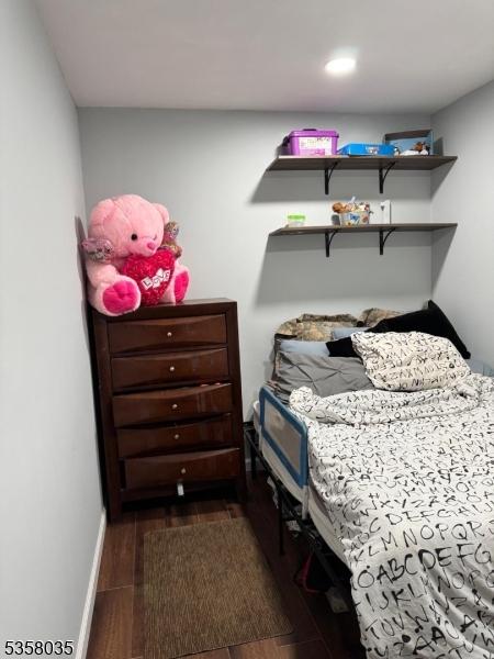 64 Dater St, North Haledon Boro, NJ 07508 - bedroom featuring dark wood-type flooring and baseboards