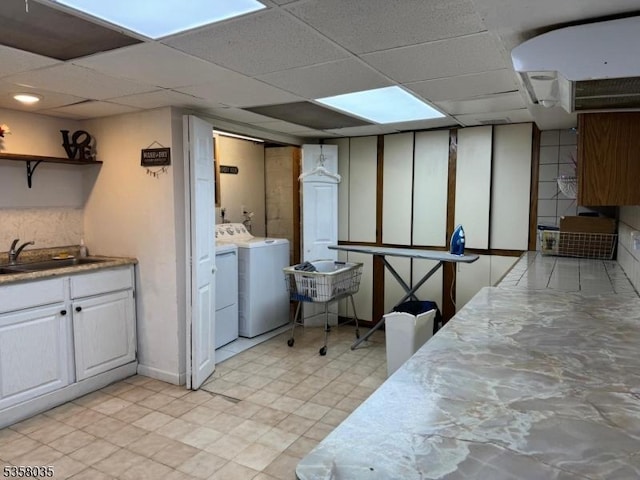 64 Dater St, North Haledon Boro, NJ 07508 - basement with washer and dryer, a sink, and a paneled ceiling