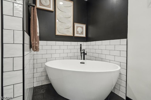 121 Wingate Dr, Independence Twp, NJ 07840 - bathroom featuring tile walls, a soaking tub, and a wainscoted wall