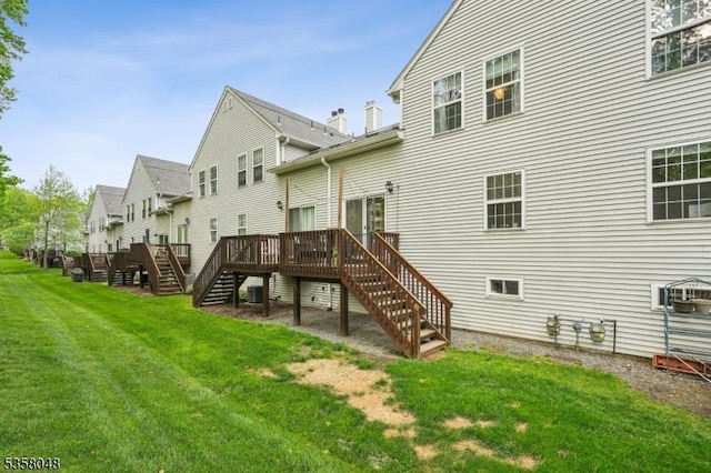 121 Wingate Dr, Independence Twp, NJ 07840 - back of house featuring stairway, a deck, and a yard