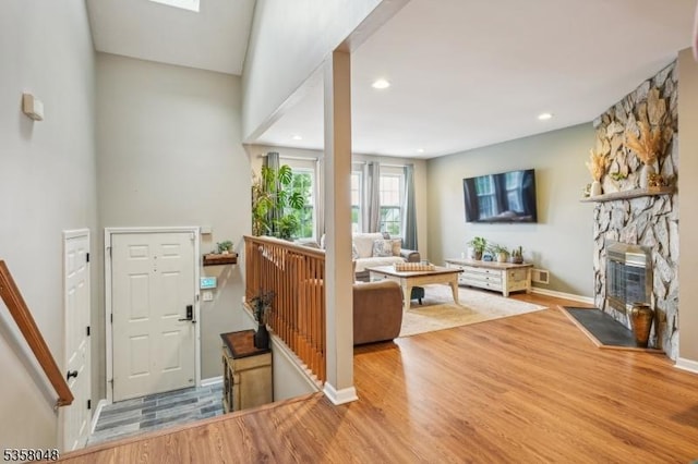 121 Wingate Dr, Independence Twp, NJ 07840 - entrance foyer with wood finished floors, a fireplace, baseboards, and recessed lighting