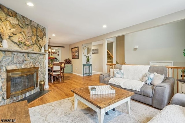 121 Wingate Dr, Independence Twp, NJ 07840 - living room featuring stairway, wood finished floors, recessed lighting, a chandelier, and baseboards