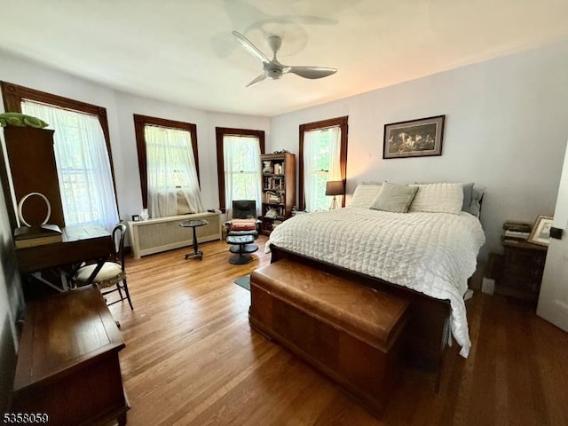 208 Rockaway St, Boonton Town, NJ 07005 - bedroom with wood finished floors, radiator, and a ceiling fan