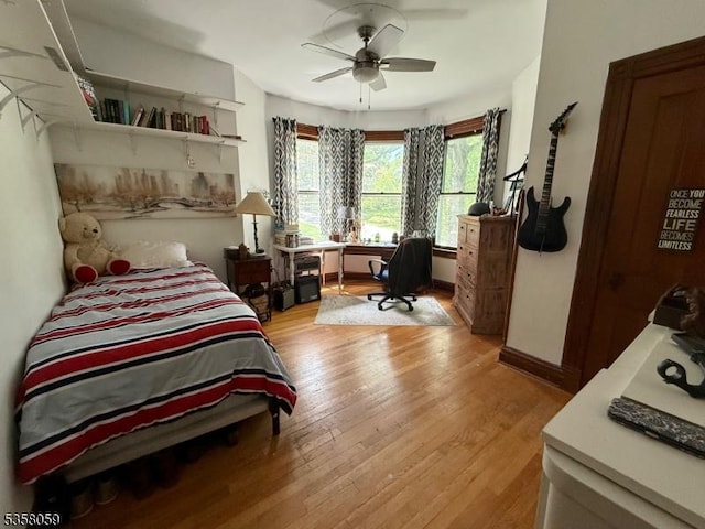 208 Rockaway St, Boonton Town, NJ 07005 - bedroom with light wood finished floors, a ceiling fan, baseboards, and a desk
