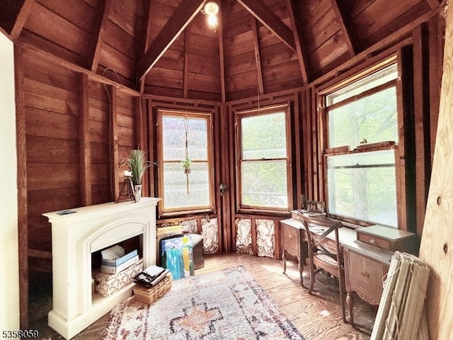208 Rockaway St, Boonton Town, NJ 07005 - living area with lofted ceiling, wooden ceiling, a desk, wood walls, and wood finished floors