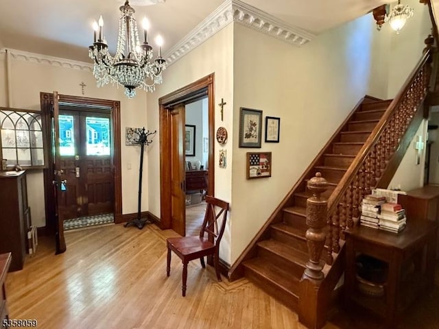208 Rockaway St, Boonton Town, NJ 07005 - foyer featuring a chandelier, light wood finished floors, stairway, and crown molding