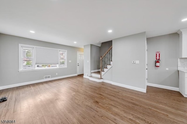 2516-2518 Allen Ave, Union Twp, NJ 07083 - unfurnished living room featuring baseboards, wood finished floors, stairs, and recessed lighting