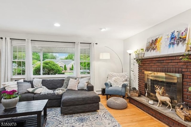 95 Union Ave, Edison Twp, NJ 08820 - living area with wood finished floors, a brick fireplace, and recessed lighting