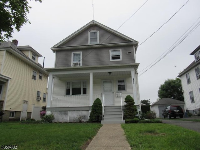 277 Watchung Ave, North Plainfield Boro, NJ 07060 - american foursquare style home featuring covered porch and a front lawn