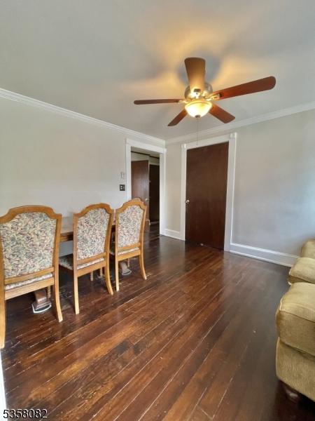 277 Watchung Ave, North Plainfield Boro, NJ 07060 - living area with ceiling fan, crown molding, wood-type flooring, and baseboards