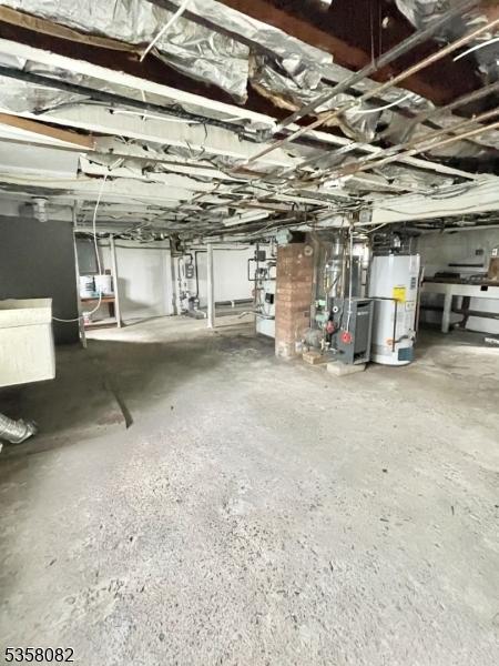 277 Watchung Ave, North Plainfield Boro, NJ 07060 - unfinished basement with gas water heater and a heating unit