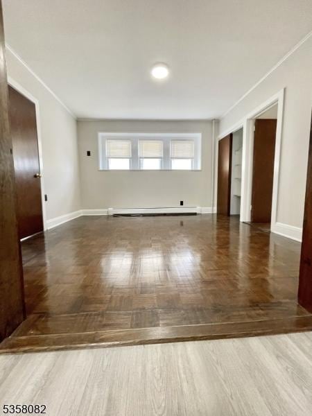 277 Watchung Ave, North Plainfield Boro, NJ 07060 - unfurnished room featuring baseboard heating, baseboards, and ornamental molding