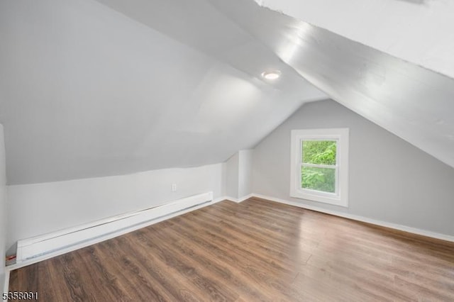 1353 W 3rd St, Plainfield City, NJ 07063 - additional living space featuring lofted ceiling, a baseboard heating unit, wood finished floors, and baseboards