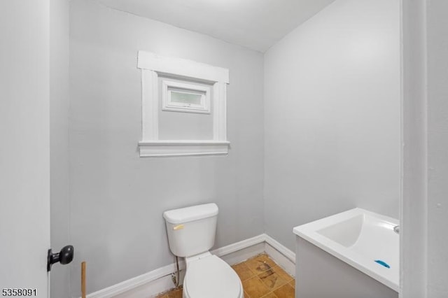 1353 W 3rd St, Plainfield City, NJ 07063 - bathroom featuring toilet, vanity, and baseboards