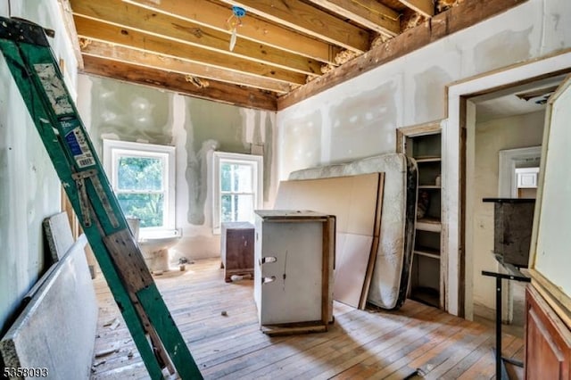 miscellaneous room featuring hardwood / wood-style flooring