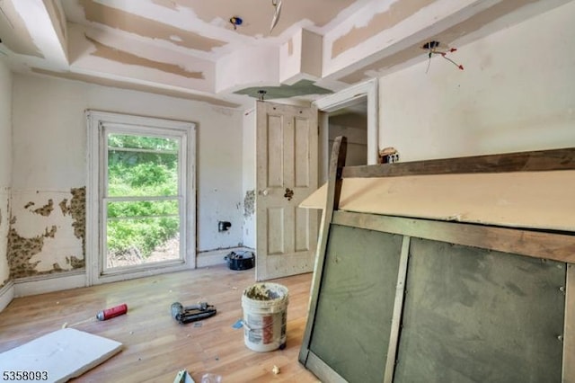 empty room with light wood finished floors
