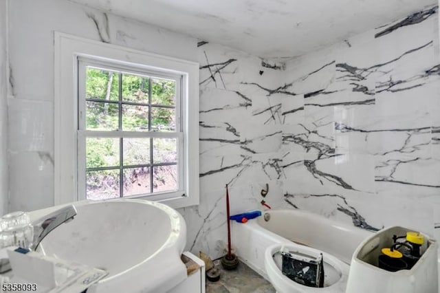 bathroom with a tub