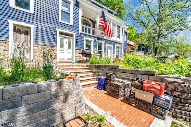 view of patio / terrace featuring a balcony
