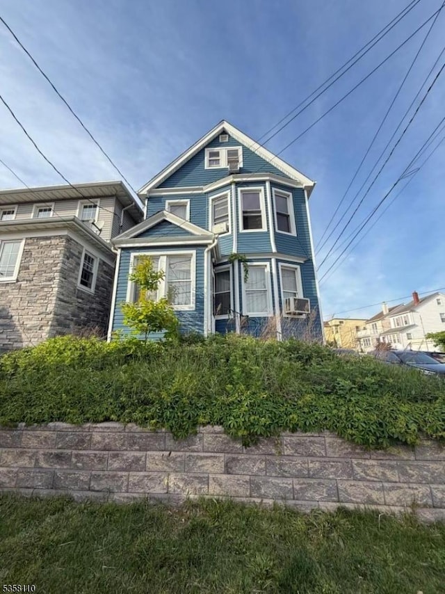 19 Wilson Ave, Kearny Town, NJ 07032 - victorian house with stone siding and cooling unit