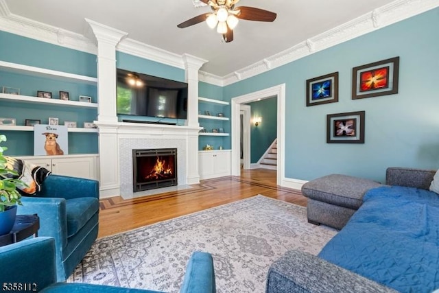 208 W Milton Ave, Rahway City, NJ 07065 - living room featuring wood finished floors, a ceiling fan, built in features, ornamental molding, and baseboards