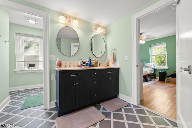 208 W Milton Ave, Rahway City, NJ 07065 - bathroom featuring tile patterned floors, vanity, and baseboards