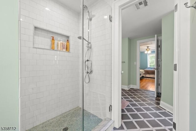 208 W Milton Ave, Rahway City, NJ 07065 - ensuite bathroom with a shower stall, baseboards, and tile patterned floors