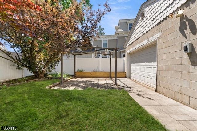 208 W Milton Ave, Rahway City, NJ 07065 - view of yard with a garage and driveway