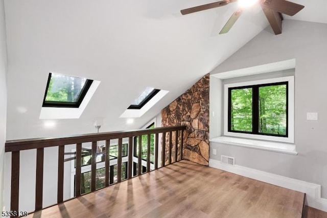 19 Village Way Unit 7H, Vernon Twp, NJ 07462 - bonus room featuring a skylight, ceiling fan, beamed ceiling, high vaulted ceiling, and wood finished floors