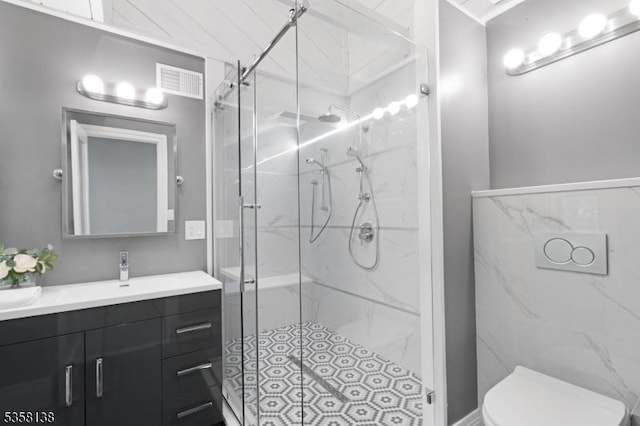 19 Village Way Unit 7H, Vernon Twp, NJ 07462 - full bathroom with a marble finish shower, toilet, and vanity