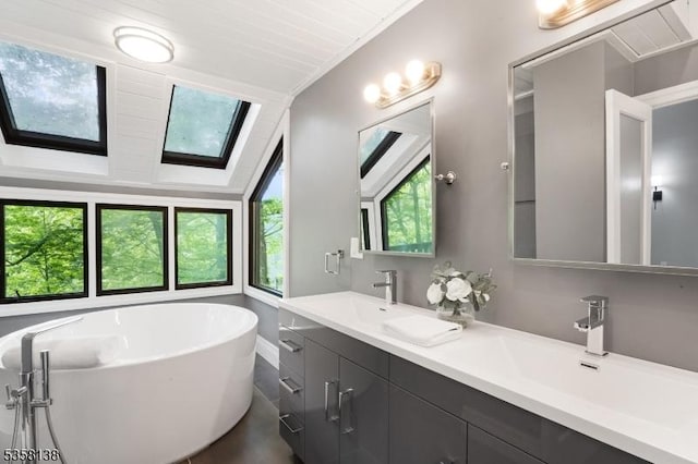 19 Village Way Unit 7H, Vernon Twp, NJ 07462 - full bath featuring double vanity, a freestanding tub, and a skylight