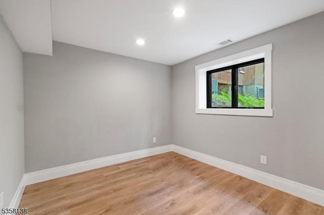 19 Village Way Unit 7H, Vernon Twp, NJ 07462 - empty room featuring recessed lighting, baseboards, and light wood-style floors