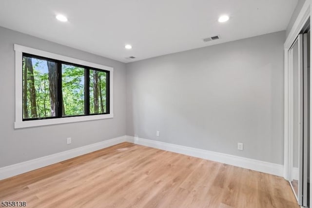 19 Village Way Unit 7H, Vernon Twp, NJ 07462 - empty room featuring baseboards, light wood-style floors, and recessed lighting