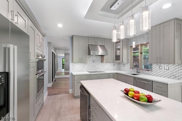 19 Village Way Unit 7H, Vernon Twp, NJ 07462 - kitchen featuring stainless steel appliances, gray cabinets, under cabinet range hood, wine cooler, and tasteful backsplash