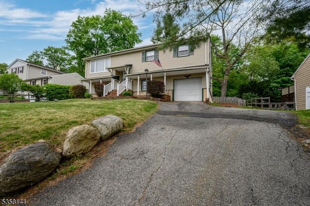 view of front of house with a garage and driveway