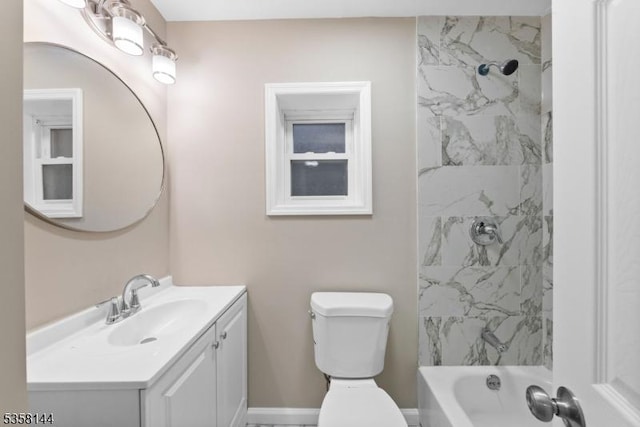full bath with vanity, toilet, and shower / washtub combination