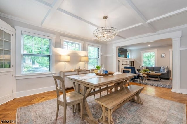 132 Linden Ave, Glen Ridge Boro Twp, NJ 07028 - dining area with coffered ceiling, a chandelier, baseboards, a fireplace, and ornamental molding
