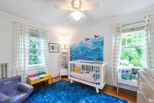 132 Linden Ave, Glen Ridge Boro Twp, NJ 07028 - bedroom with multiple windows, wood finished floors, ceiling fan, and ornamental molding