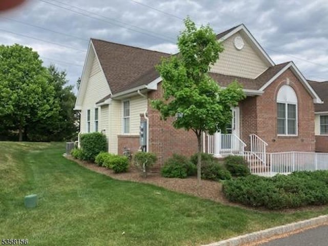 109 Samson Dr, Raritan Twp, NJ 08822 - view of front facade featuring a front lawn and brick siding